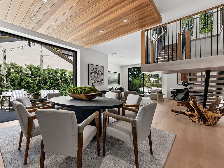 Completed custom home interior — open kitchen and dining